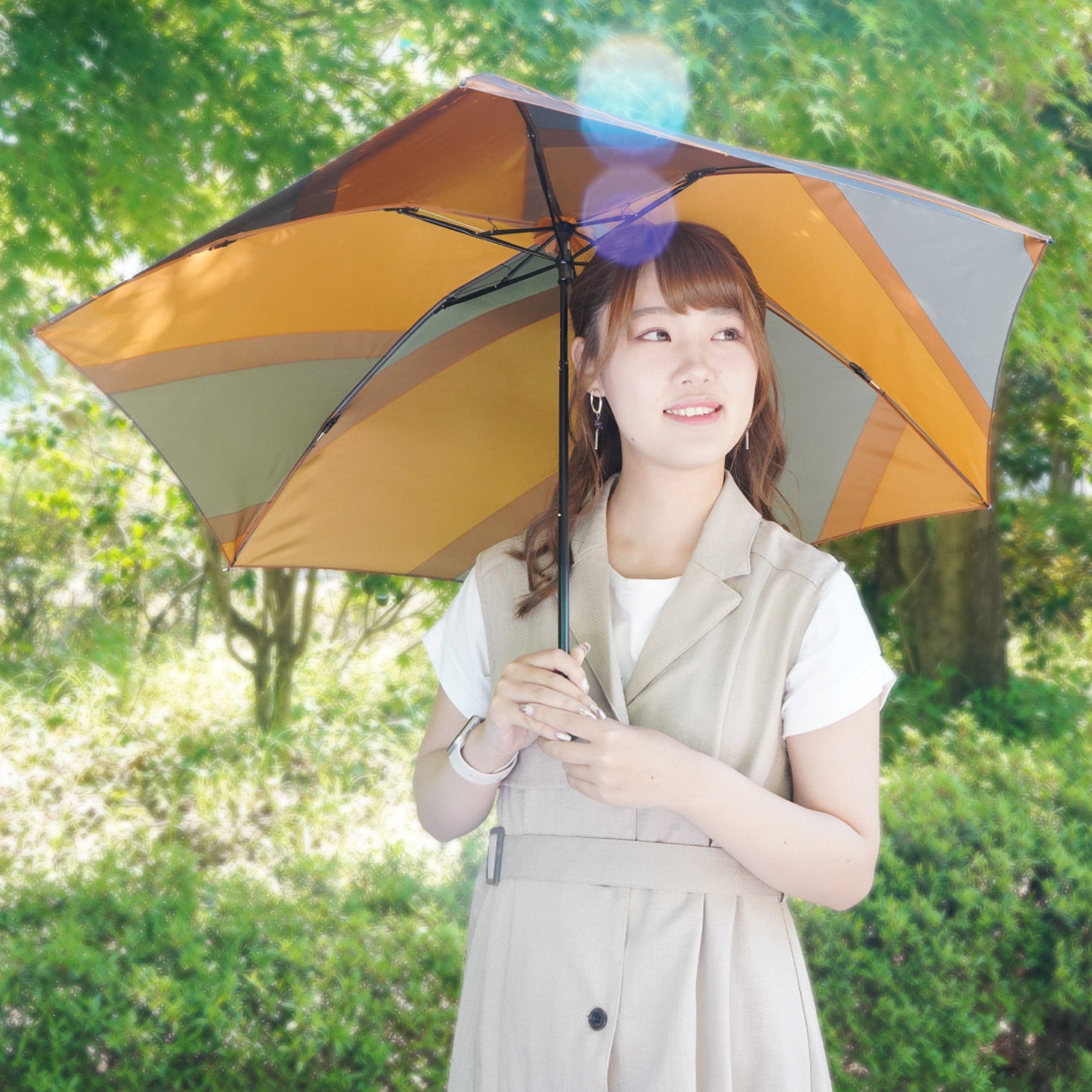 晴雨兼用 レディース メンズ repel. Portable umbrella Orange 折りたたみ傘 使用イメージ